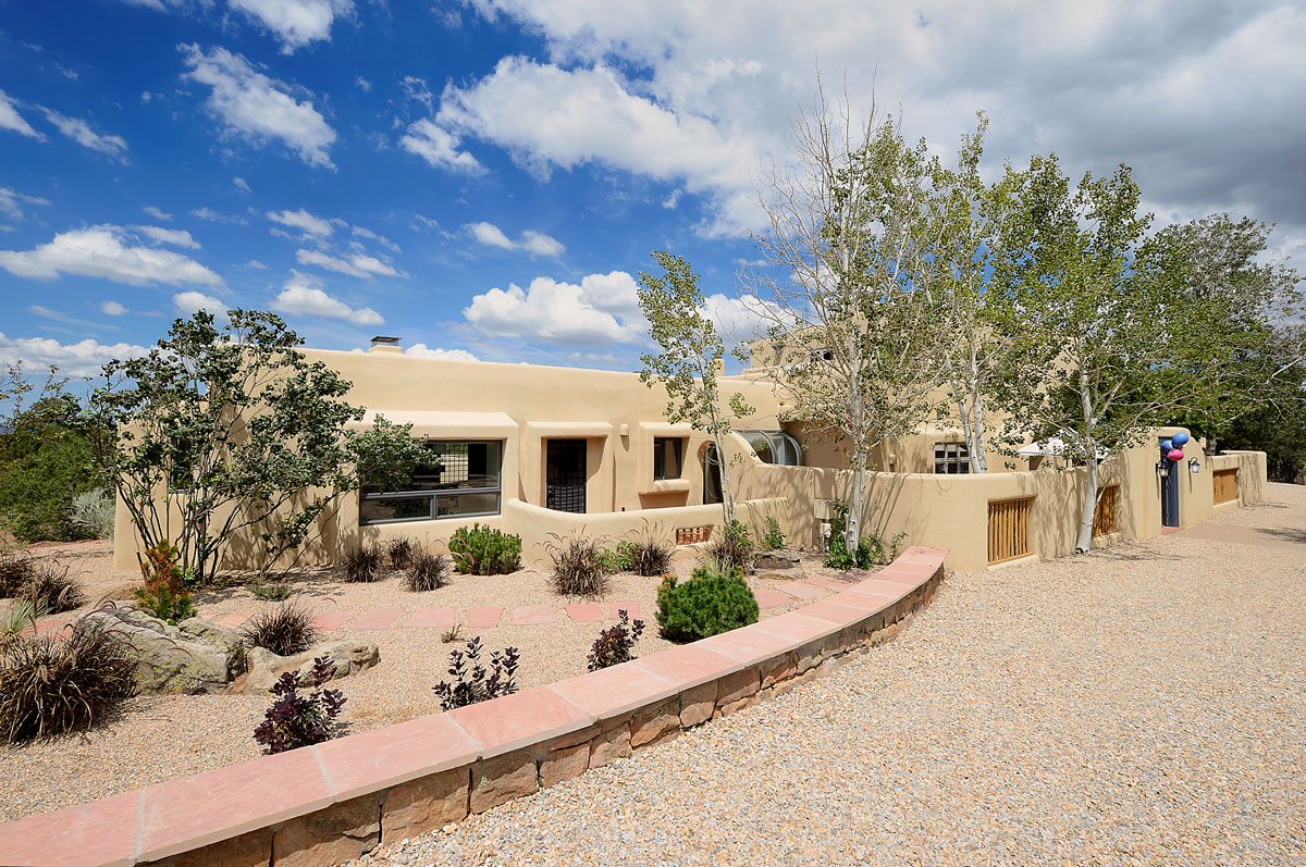 A stunning 5,800 square-foot residence, recently renovated and set on 1.5 acres, blending Asian aesthetics with the cozy charm of classic New Mexico design.
